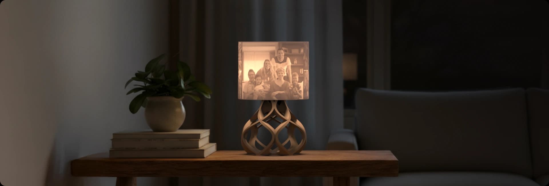 Aurora Personalized 3D printed photo lamp glowing warmly on a wooden table in a cozy living room.